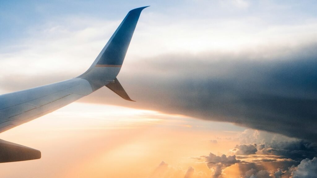 airplane on sky during golden hour